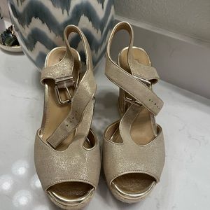 Like new Antonio Milani, wedge peep, toe sandal, gold.